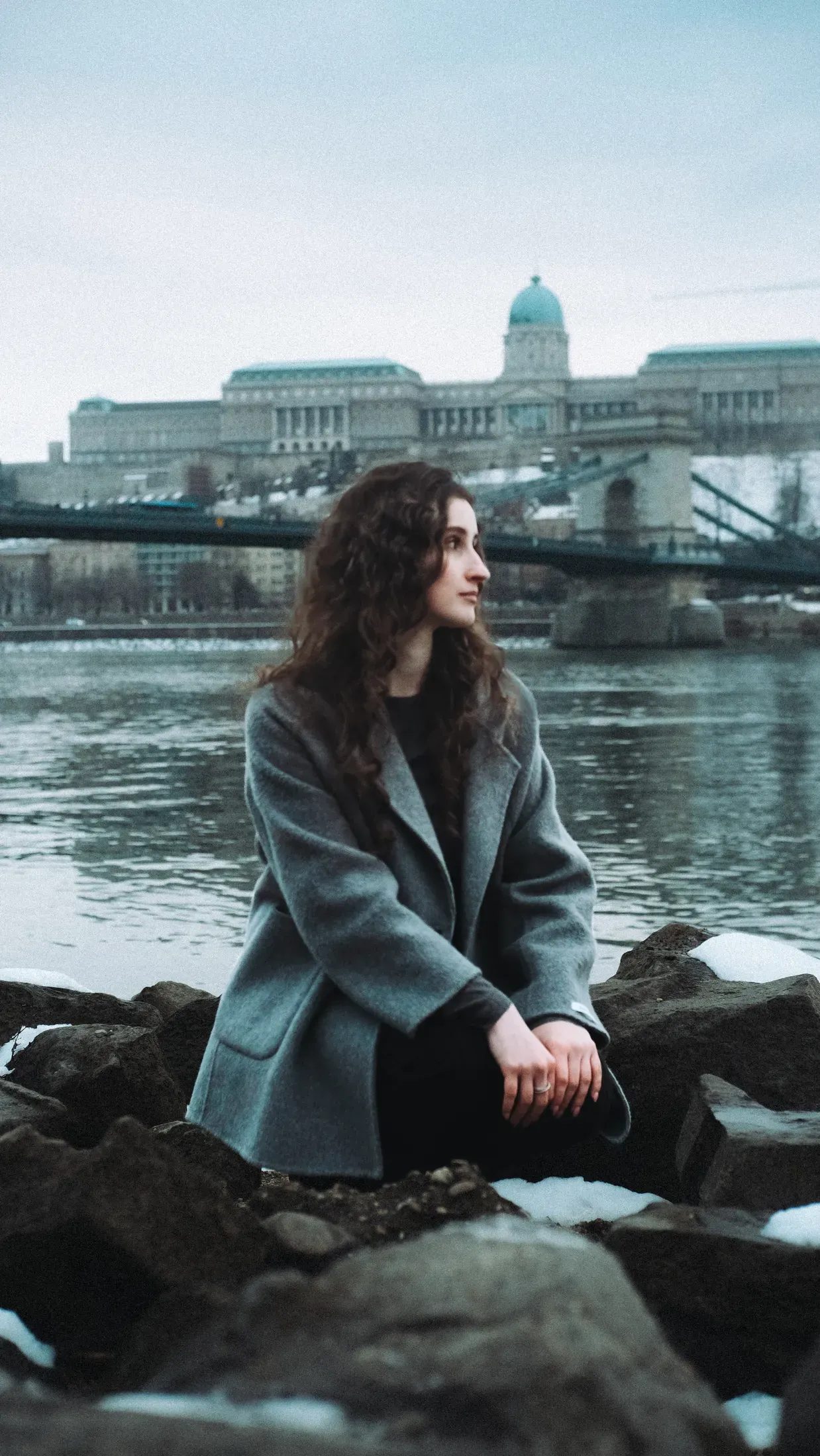 Portrait beside the Danube with Buda Castle and Chain Bridge in the background