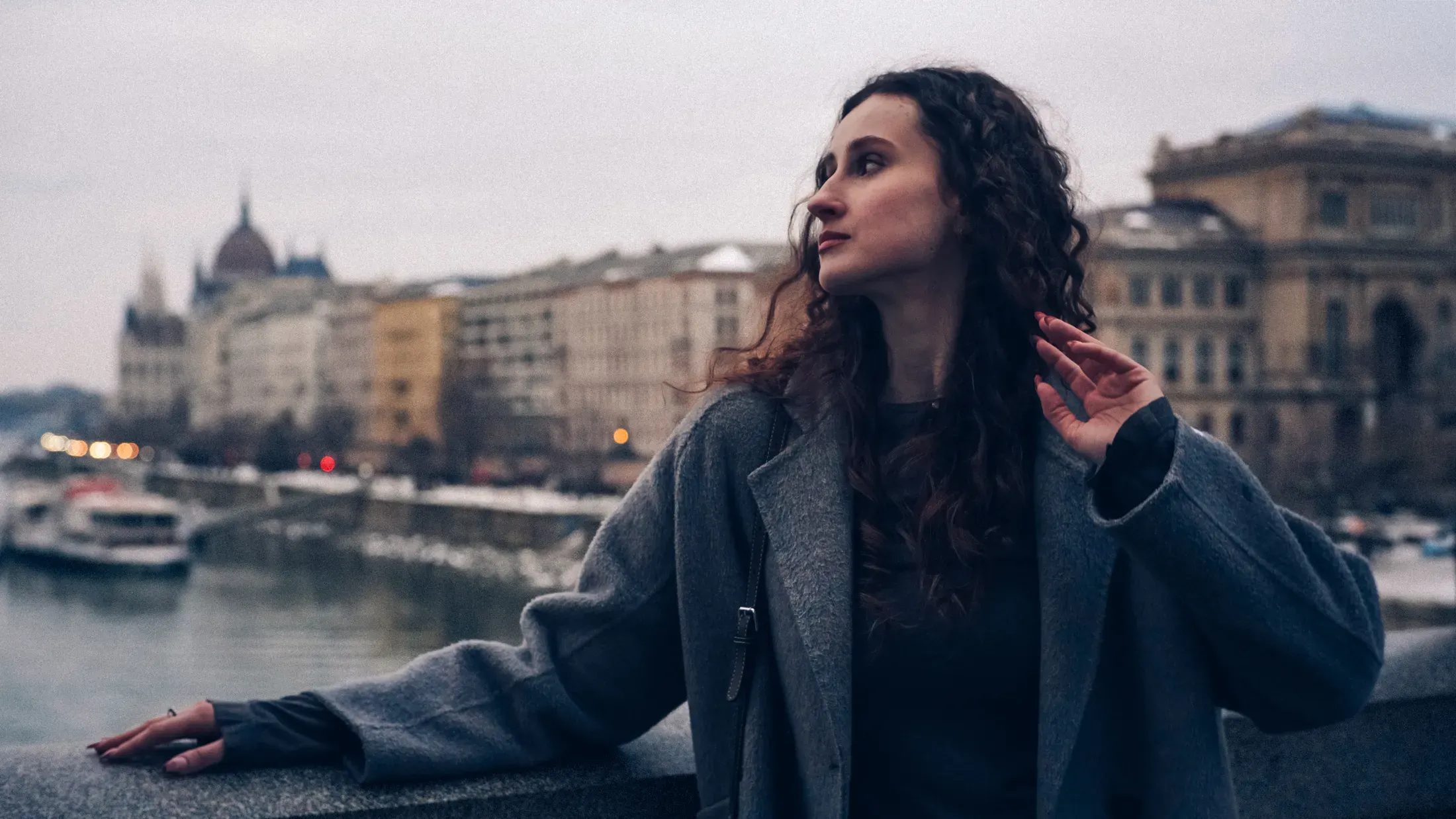 Portrait by the Danube with the Hungarian Parliament across the river